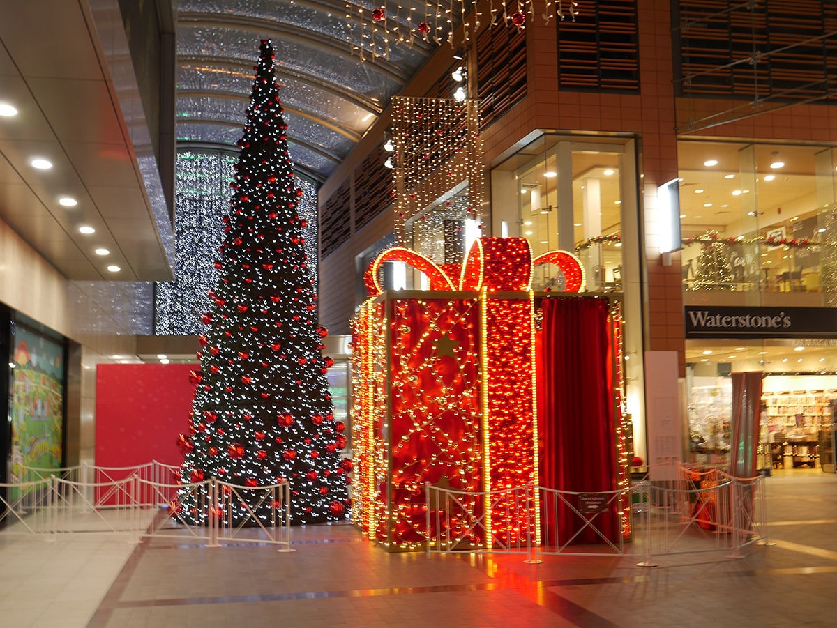 Hotel entrance wrapped with Christmas lights