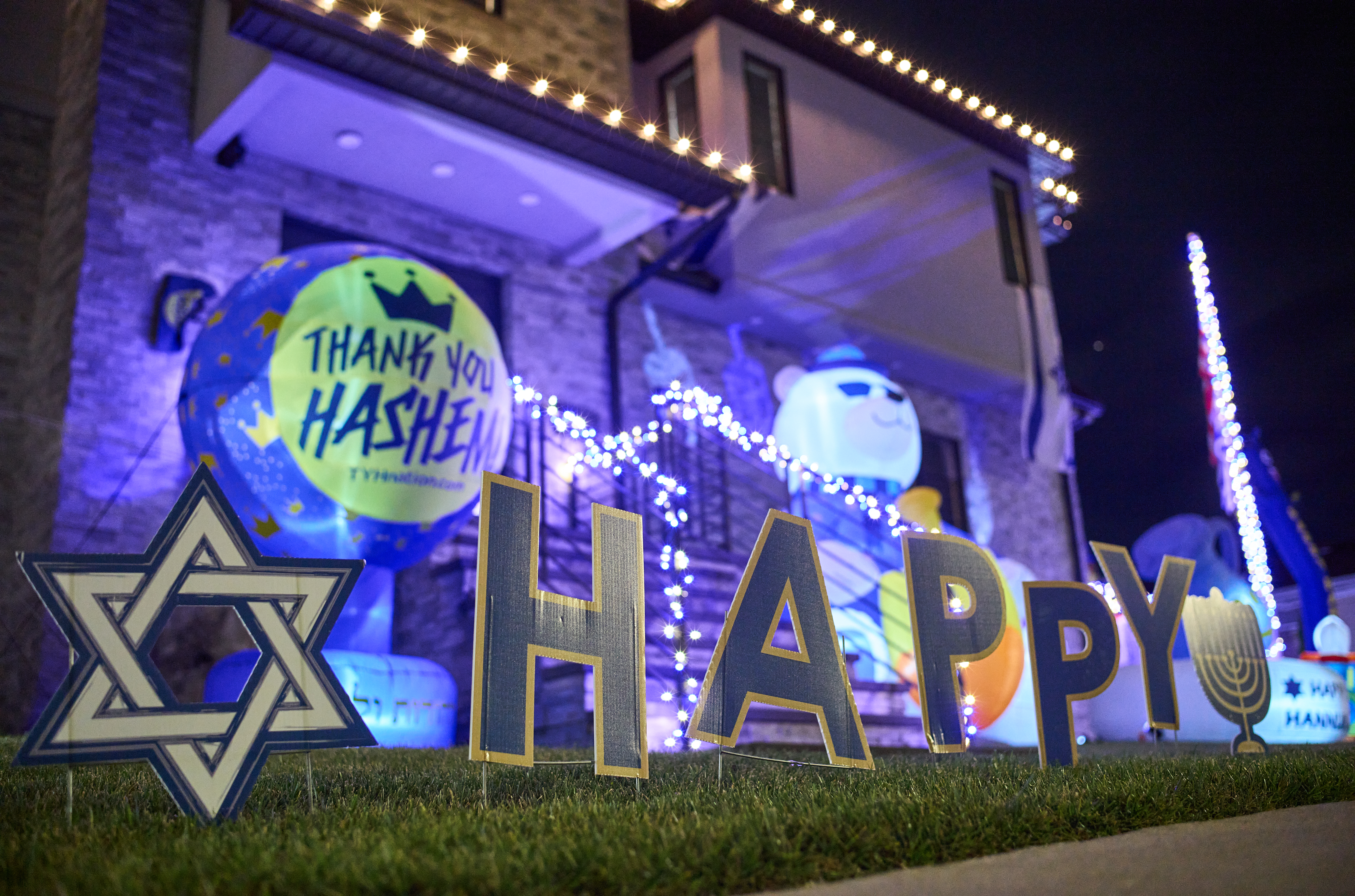 Hanukkah family celebration lighting in Austin