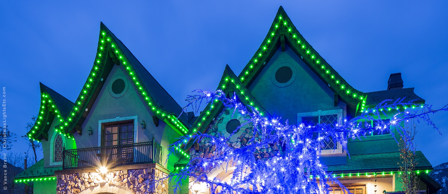 Blue roof lights Christmas display in Austin